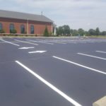 Sealing and Striping asphalt parking lot at St. Gianna in Wentzville, MO